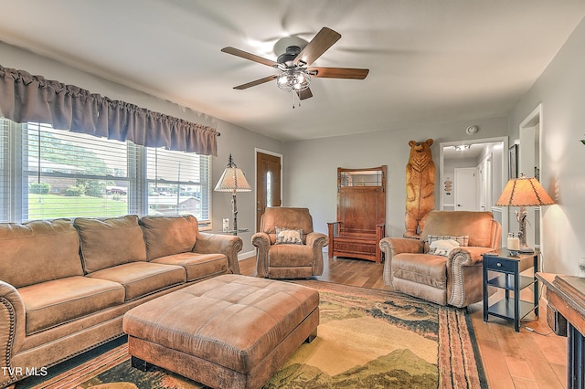 404 Stuffle St, Kingsport, TN 37660 - living area with ceiling fan and light wood-style flooring