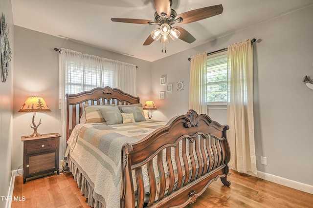 404 Stuffle St, Kingsport, TN 37660 - bedroom featuring wood finished floors and ceiling fan