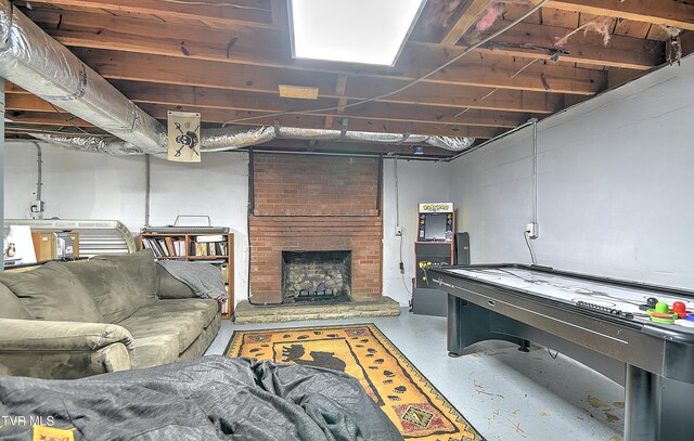 404 Stuffle St, Kingsport, TN 37660 - unfinished below grade area with a brick fireplace