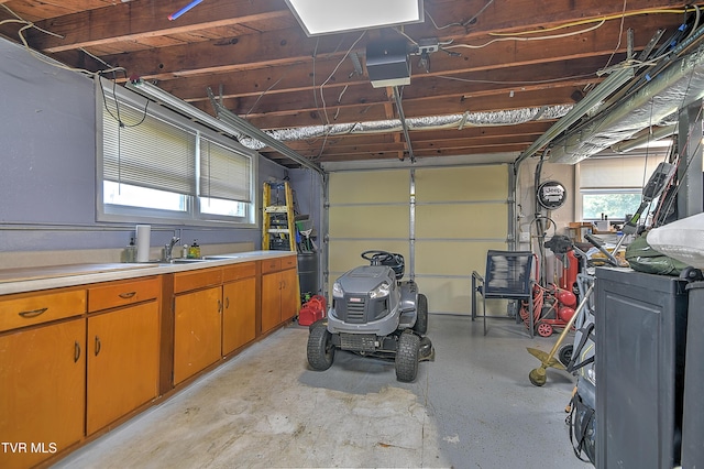 404 Stuffle St, Kingsport, TN 37660 - garage featuring a garage door opener and a sink