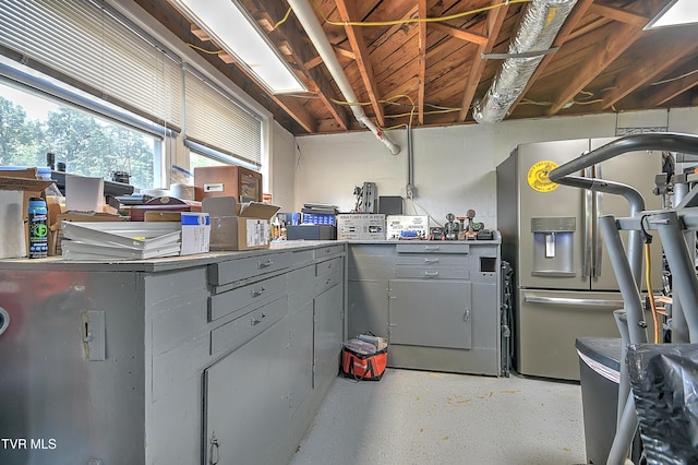 404 Stuffle St, Kingsport, TN 37660 - basement featuring stainless steel refrigerator with ice dispenser