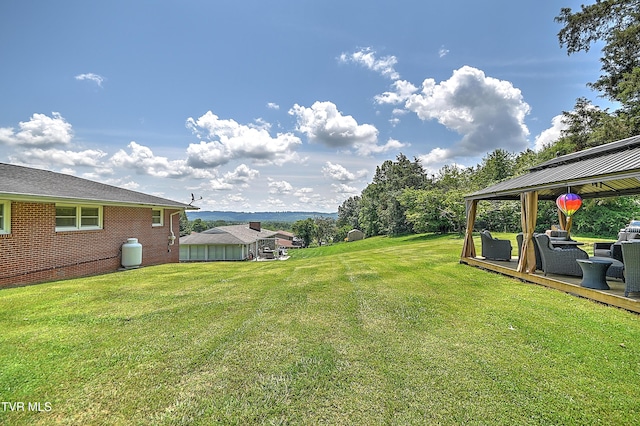 404 Stuffle St, Kingsport, TN 37660 - view of grassy yard featuring a gazebo and outdoor lounge area
