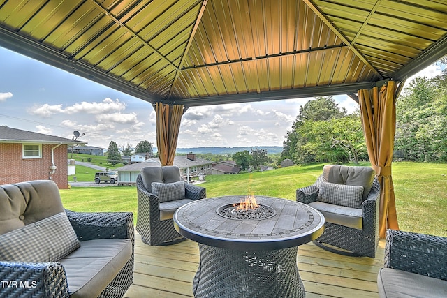 404 Stuffle St, Kingsport, TN 37660 - wooden deck with a gazebo, a lawn, and an outdoor living space with a fire pit