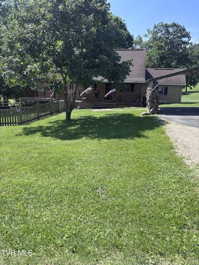 133 Deacon Creek Rd, Erwin, TN 37650 - view of yard with a carport and asphalt driveway