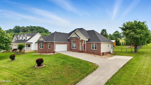 1844 Weaver Branch Rd, Piney Flats, TN 37686 - traditional home with crawl space, concrete driveway, a garage, brick siding, and roof with shingles