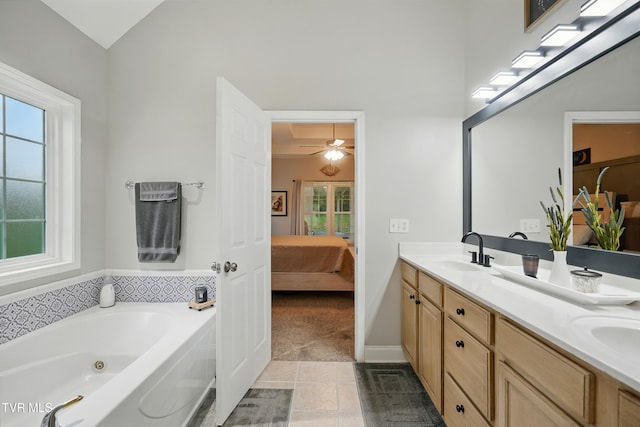1844 Weaver Branch Rd, Piney Flats, TN 37686 - bathroom with connected bathroom, double vanity, tile patterned flooring, a jetted tub, and a ceiling fan