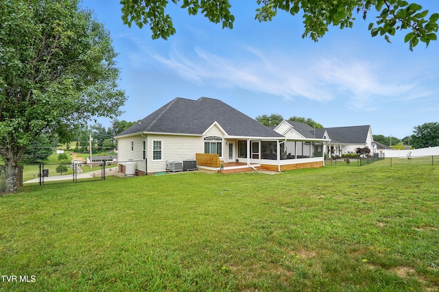1844 Weaver Branch Rd, Piney Flats, TN 37686 - back of house with a sunroom, a fenced backyard, a gate, and roof with shingles