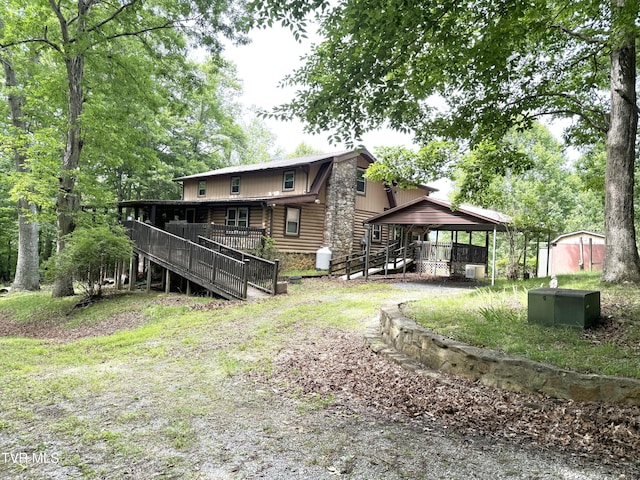 2401 Egan Rd, Big Stone Gap, VA 24219 - back of property featuring log exterior, stairway, and a gazebo