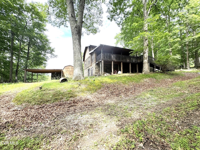 2401 Egan Rd, Big Stone Gap, VA 24219 - rear view of property featuring a wooden deck and a carport