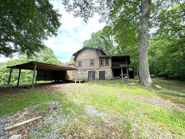 2401 Egan Rd, Big Stone Gap, VA 24219 - back of house with stone siding and a wooden deck