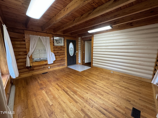 2401 Egan Rd, Big Stone Gap, VA 24219 - entrance foyer with a wood ceiling with exposed beams, hardwood / wood-style floors, and log walls