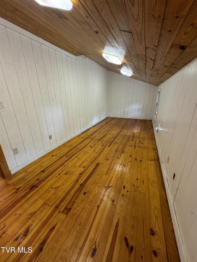 2401 Egan Rd, Big Stone Gap, VA 24219 - spare room with hardwood / wood-style flooring, wooden ceiling, and wooden walls