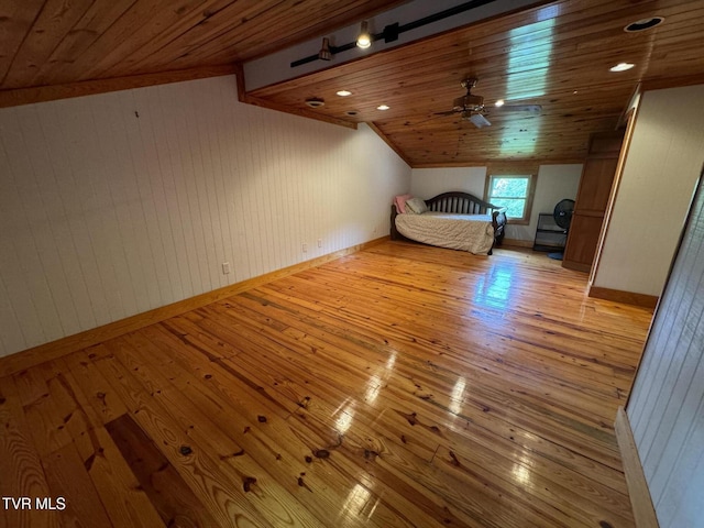 2401 Egan Rd, Big Stone Gap, VA 24219 - unfurnished bedroom with light wood-type flooring, wooden walls, wooden ceiling, and lofted ceiling