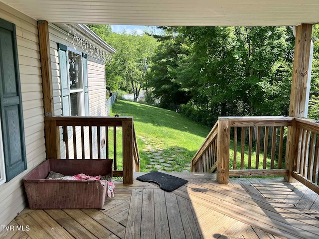 692 NE Hamner Ave, Norton, VA 24273 - wooden deck featuring a yard