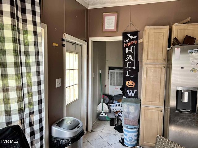 692 NE Hamner Ave, Norton, VA 24273 - kitchen featuring stainless steel refrigerator with ice dispenser, light tile patterned flooring, ornamental molding, and light brown cabinetry