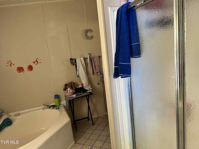692 NE Hamner Ave, Norton, VA 24273 - bathroom with tile patterned floors, a garden tub, and a stall shower