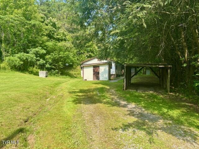 11616 Alfred Cox Rd, Pound, VA 24279 - view of grassy yard featuring an outdoor structure