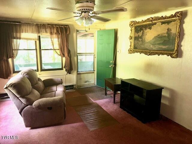 11616 Alfred Cox Rd, Pound, VA 24279 - living area with ceiling fan and carpet