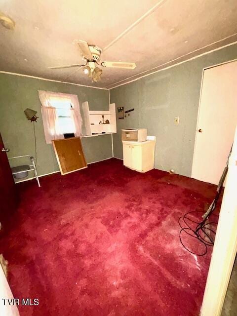 11616 Alfred Cox Rd, Pound, VA 24279 - unfurnished living room featuring a ceiling fan and carpet flooring