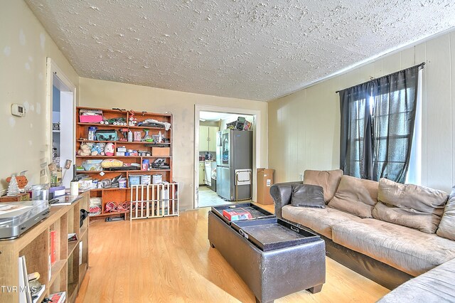 11 Birch St, Bristol, TN 37620 - living room with a textured ceiling and wood finished floors