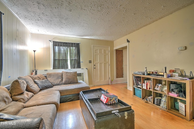 11 Birch St, Bristol, TN 37620 - living room featuring wood finished floors and a textured ceiling