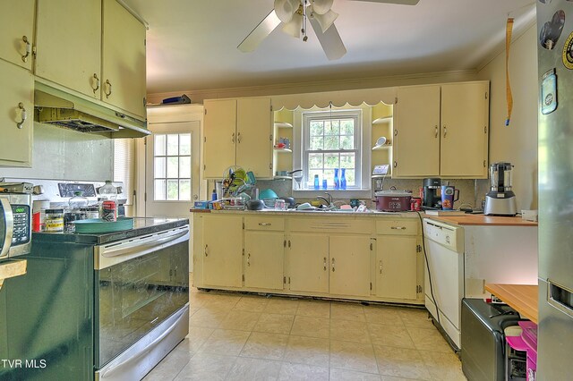 11 Birch St, Bristol, TN 37620 - kitchen featuring stainless steel appliances, cream cabinets, under cabinet range hood, open shelves, and ceiling fan