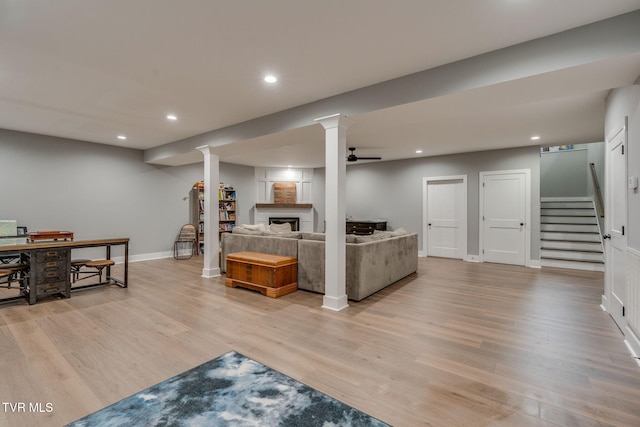 3137 London Rd, Kingsport, TN 37664 - living area featuring light wood-type flooring, recessed lighting, a fireplace, and stairway