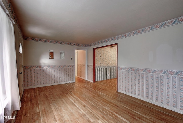 512 Old Airport Rd, Bristol, VA 24201 - unfurnished room with a wainscoted wall and wood-type flooring