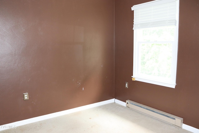 45 Laurel Rdg, Big Stone Gap, VA 24219 - empty room featuring a baseboard radiator, plenty of natural light, and carpet