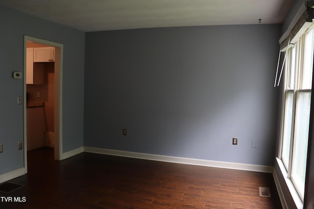 45 Laurel Rdg, Big Stone Gap, VA 24219 - empty room with dark wood-type flooring and fire sprinkler in ceiling