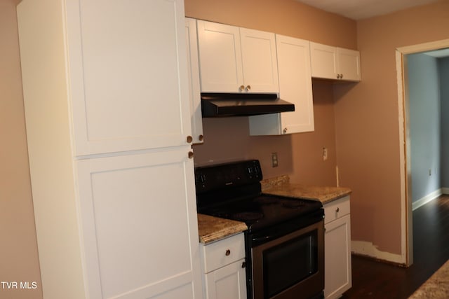 45 Laurel Rdg, Big Stone Gap, VA 24219 - kitchen featuring under cabinet range hood, stainless steel range with electric cooktop, white cabinetry, stone counters, and dark wood-type flooring