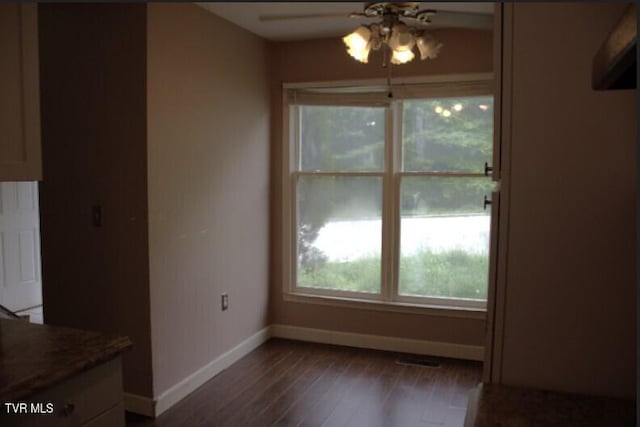 45 Laurel Rdg, Big Stone Gap, VA 24219 - unfurnished dining area featuring ceiling fan and dark wood-style floors