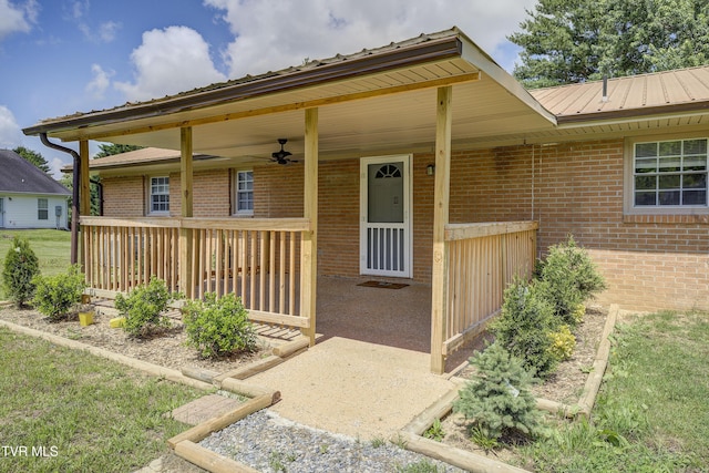 118 Hilbert Cir, Jonesborough, TN 37659 - doorway to property featuring brick siding, ceiling fan, and a metal roof
