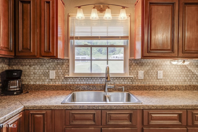 118 Hilbert Cir, Jonesborough, TN 37659 - kitchen featuring tasteful backsplash and brown cabinetry