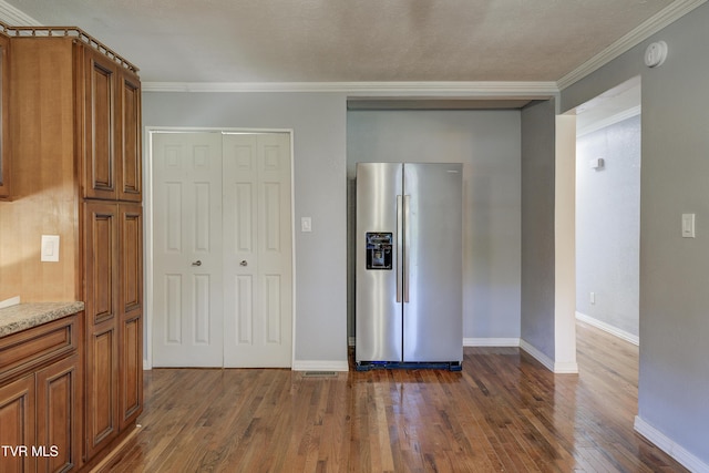 118 Hilbert Cir, Jonesborough, TN 37659 - kitchen with stainless steel fridge with ice dispenser, crown molding, dark wood-style flooring, brown cabinets, and light stone counters