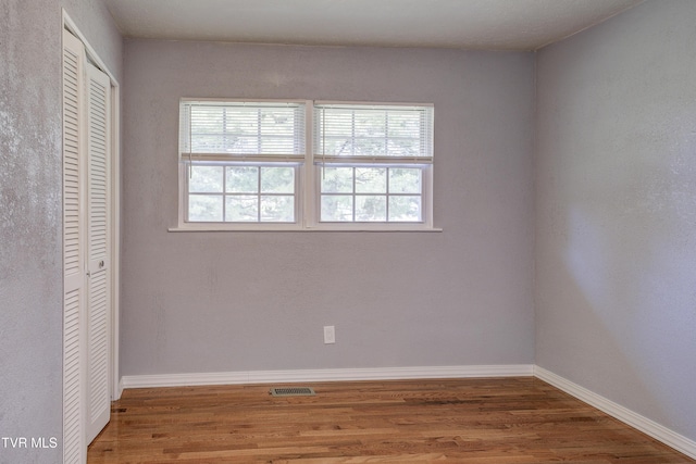 118 Hilbert Cir, Jonesborough, TN 37659 - unfurnished bedroom featuring wood finished floors and a closet