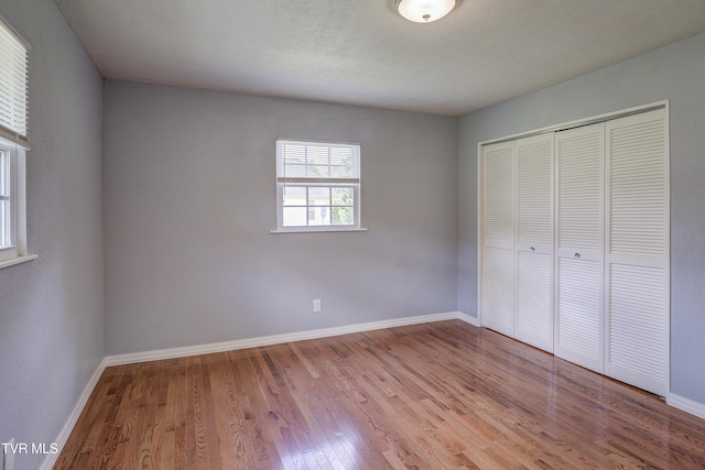 118 Hilbert Cir, Jonesborough, TN 37659 - unfurnished bedroom featuring wood finished floors and a closet