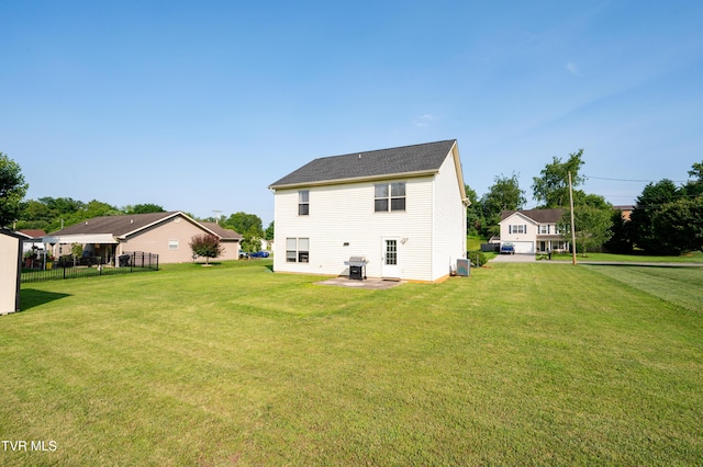 395 Kings Rd, Piney Flats, TN 37686 - back of property featuring a patio and a lawn
