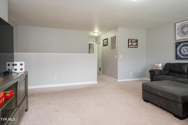 395 Kings Rd, Piney Flats, TN 37686 - living room featuring light carpet and baseboards