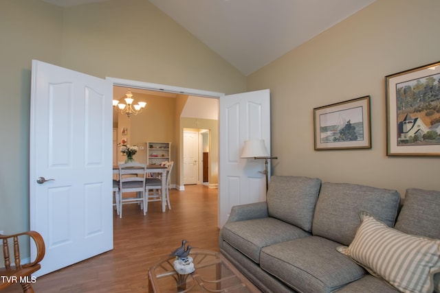 1551 Hatterdale Farm Rd Unit 1551, Blountville, TN 37617 - living area with a chandelier, wood finished floors, and high vaulted ceiling