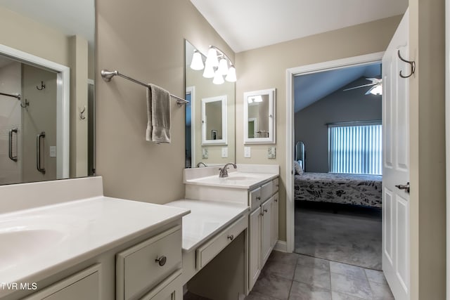 1551 Hatterdale Farm Rd Unit 1551, Blountville, TN 37617 - ensuite bathroom featuring two vanities, vaulted ceiling, and a shower with shower door