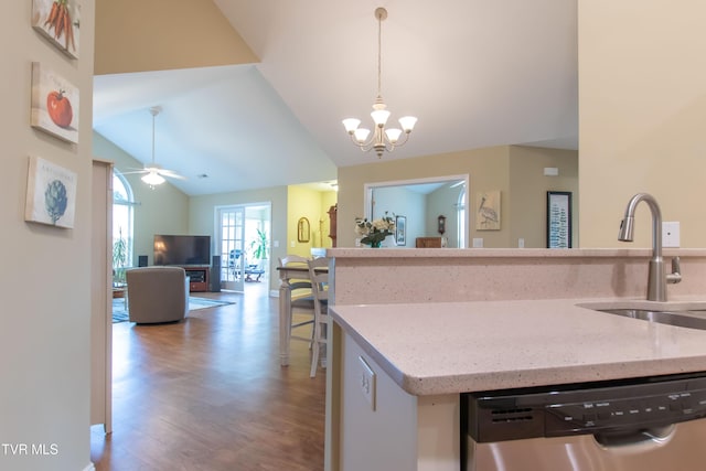 1551 Hatterdale Farm Rd Unit 1551, Blountville, TN 37617 - kitchen featuring stainless steel dishwasher, wood finished floors, vaulted ceiling, pendant lighting, and light stone countertops
