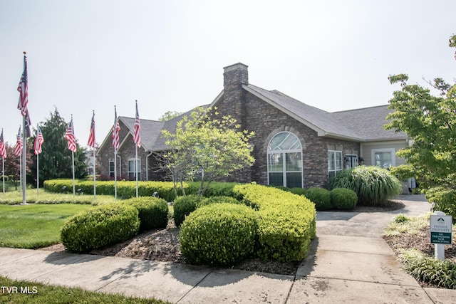 1551 Hatterdale Farm Rd Unit 1551, Blountville, TN 37617 - view of front of property with stone siding, a chimney, and a front lawn