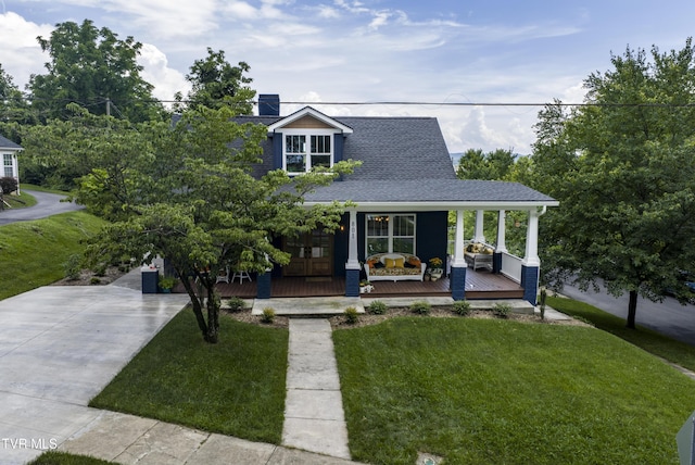 801 Watauga St, Kingsport, TN 37660 - view of front facade featuring covered porch, a front yard, and a shingled roof