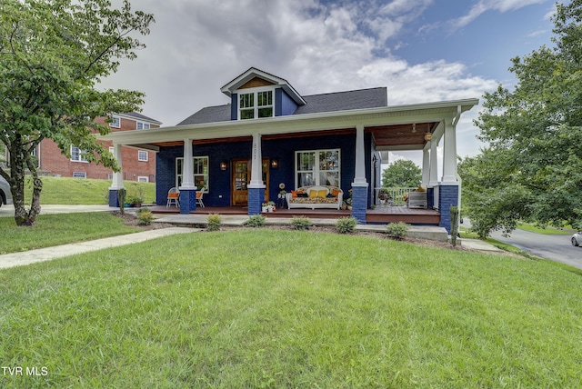 801 Watauga St, Kingsport, TN 37660 - craftsman inspired home featuring a front lawn, a porch, and brick siding