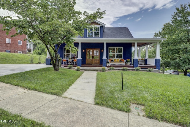801 Watauga St, Kingsport, TN 37660 - view of front of house with a porch, a front lawn, and french doors