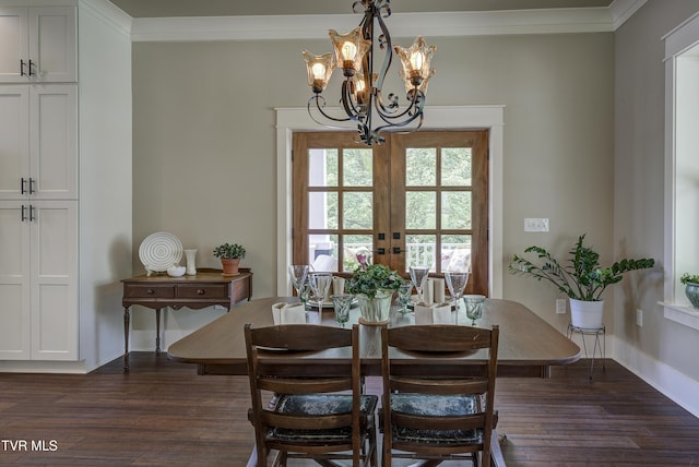 801 Watauga St, Kingsport, TN 37660 - dining room with dark wood finished floors, a chandelier, crown molding, and french doors