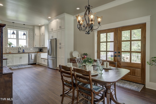 801 Watauga St, Kingsport, TN 37660 - dining space featuring dark wood-style flooring, recessed lighting, a chandelier, crown molding, and french doors