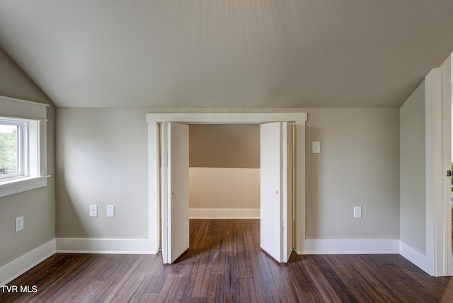 801 Watauga St, Kingsport, TN 37660 - unfurnished room with dark wood-style floors and vaulted ceiling