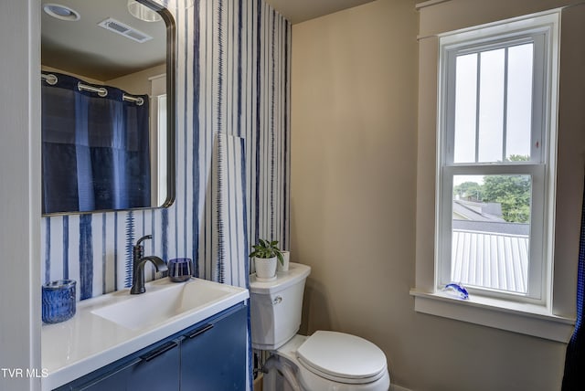 801 Watauga St, Kingsport, TN 37660 - bathroom featuring vanity and wallpapered walls